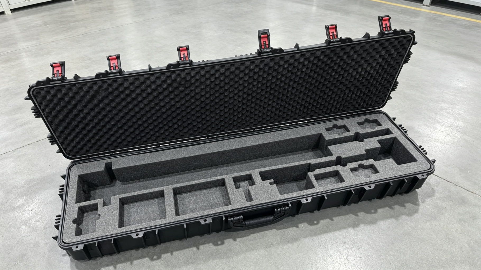 Long protective hard case with gray foam inserts